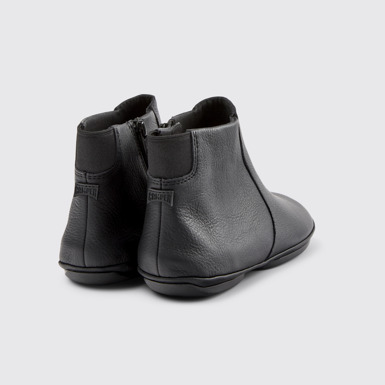 Back view of Right Black leather ankle boots for women