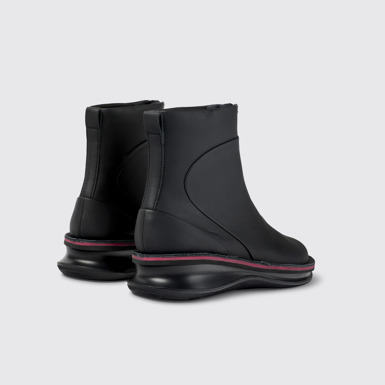 Back view of Rolling Black Boots for Women