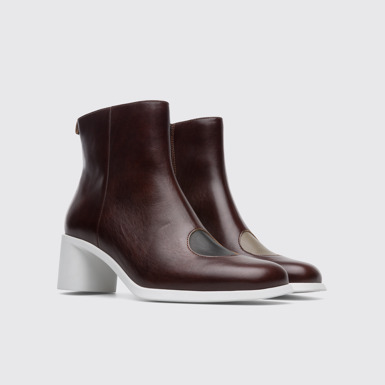 Front view of Twins Multi-colored zip up ankle boot for women