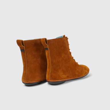 Back view of Right Brown suede ankle boots