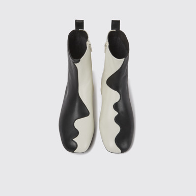 Overhead view of Twins Black and white leather boots