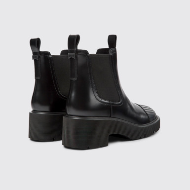 Back view of Milah Black leather Chelsea boots for women