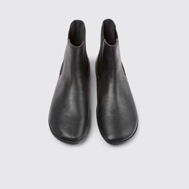 Overhead view of Right Black leather ankle boots