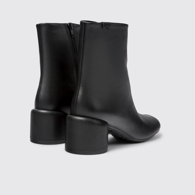 Back view of Niki Black leather boots for women