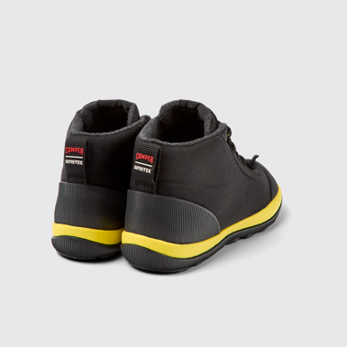 Back view of Peu Pista Black textile ankle boots for women