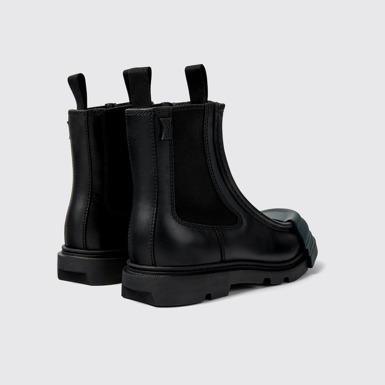 Back view of Junction Black leather chelsea boots for women