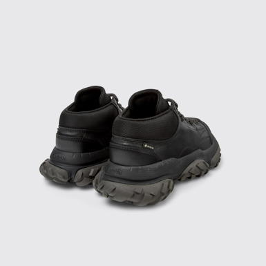 Back view of Karst Trek Black ankle boots for women