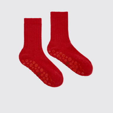 Overhead view of Camper Socks by Martí Guixé Red anti-slip socks