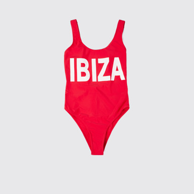 Side view of Vintage "IBIZA" swimsuit Red polyester swimsuit with white lettering