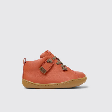 Peu Bottines en cuir orange pour enfant.