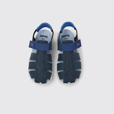 Overhead view of Oruga Blue leather sandals for kids