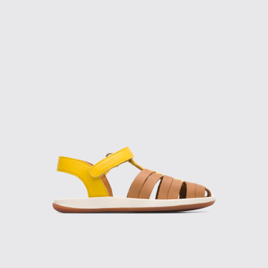 Side view of Bicho Closed yellow and tan nude T-strap sandal for kids