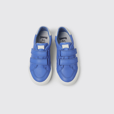 Overhead view of Pursuit Blue and white sneakers for kids