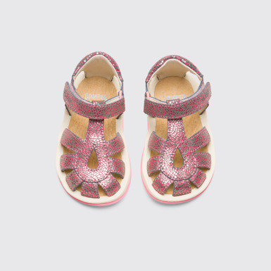 Overhead view of Bicho Closed pink T-strap kids’ sandal