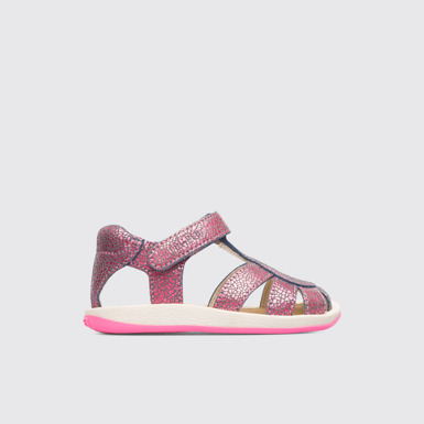 Side view of Bicho Closed pink T-strap kids’ sandal