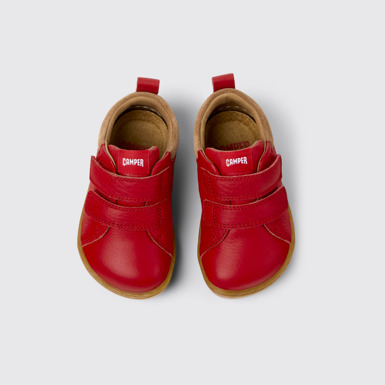 Peu Sneakers rojas y marrones para niños.