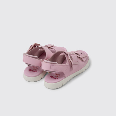 Back view of Oruga Pink leather sandals for kids