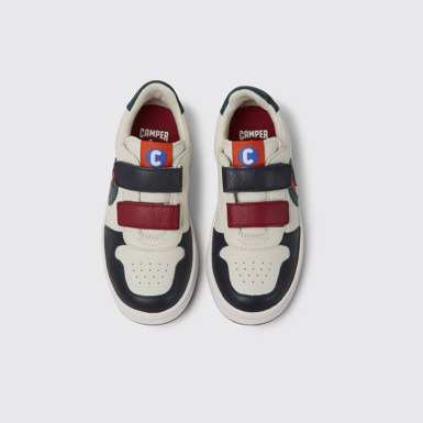 Overhead view of Runner White, blue and red sneakers