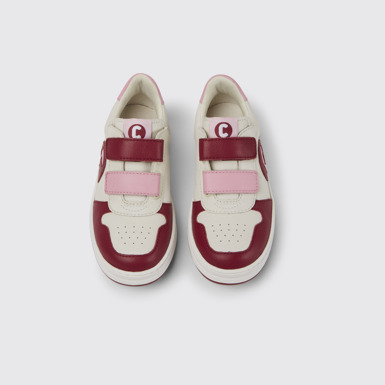 Overhead view of Runner White, pink and light pink sneakers
