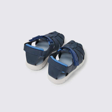 Back view of Oruga Blue leather and textile sandals