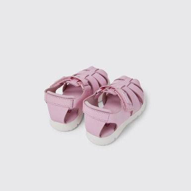 Back view of Oruga Pink leather and textile sandals