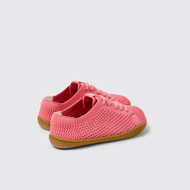 Peu Baskets roses en textile et cuir pour enfants.