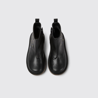 Overhead view of Twins Black leather boots