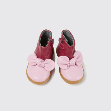 Overhead view of Pursuit Pink and light pink boots