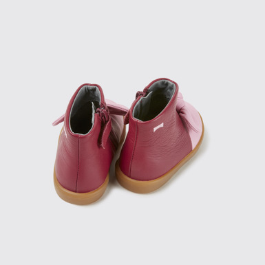 Back view of Pursuit Pink and light pink boots