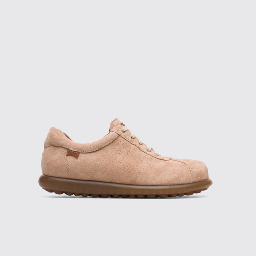 Side view of Pelotas Iconic beige shoe for women