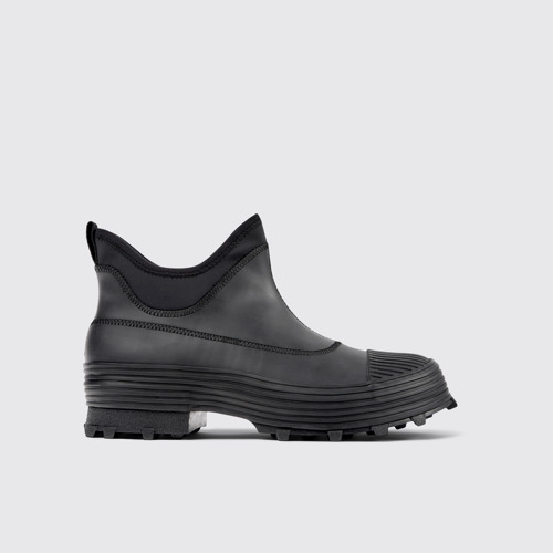 Image of Side view of Traktori Black ankle boots