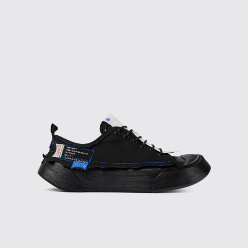Image of Side view of ADERERROR Black sneakers