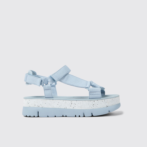 Image of Side view of Oruga Up Blue textile sandals for women
