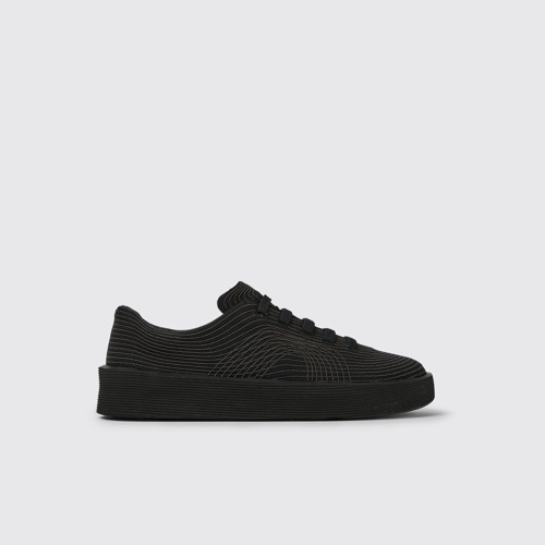 Image of Side view of Courb Black sneakers for women