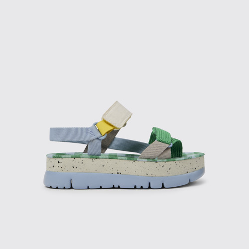 Side view of Oruga Up Blue, green, and grey sandals for women