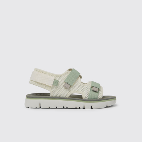 Side view of Oruga White, green, and grey sandals for women