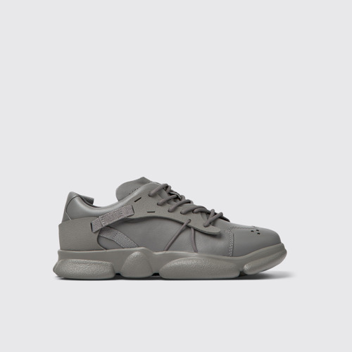 Image of Side view of Karst Gray leather and textile sneakers for women