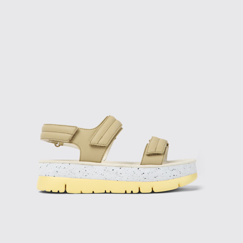 Image of Side view of Oruga Up Beige leather sandals for women