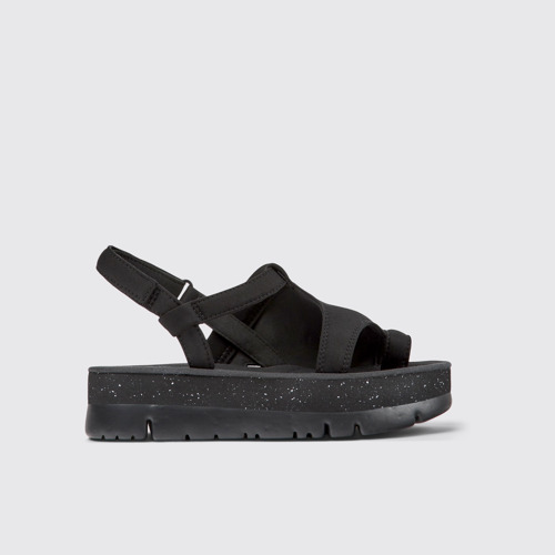 Side view of Oruga Up Black textile sandals for women