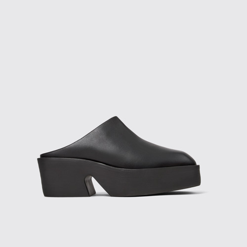 Image of Side view of Billie Black leather clogs for women