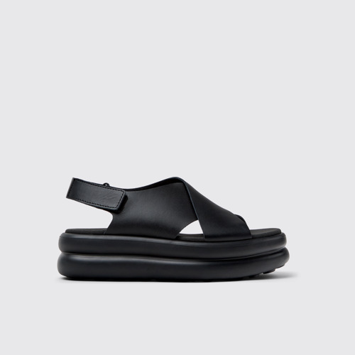 Image of Side view of Pelotas Flota Up Black Leather Sandals for Women.