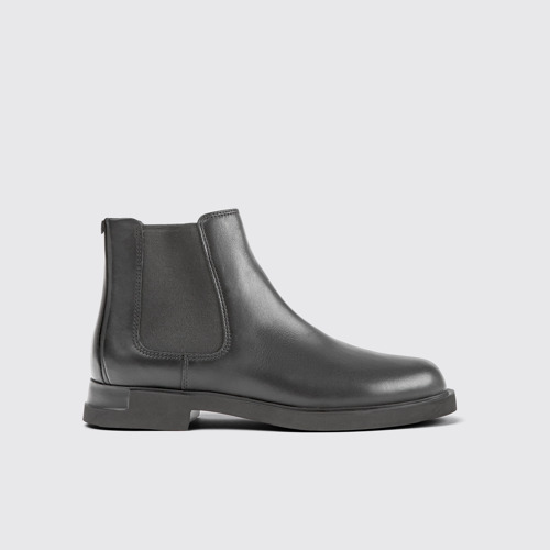 Image of Side view of Iman Black Leather Ankle Boots for Women.