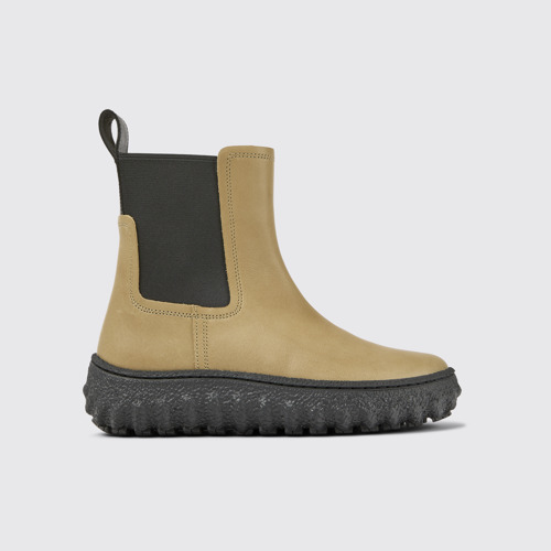 Image of Side view of Ground Beige leather ankle boots for women