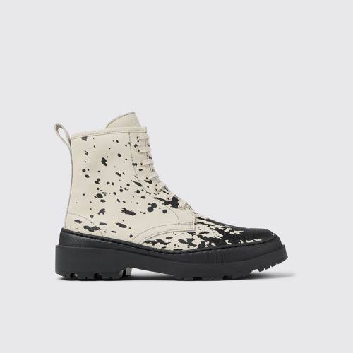 Image of Side view of Brutus Trek White and black leather boots for women