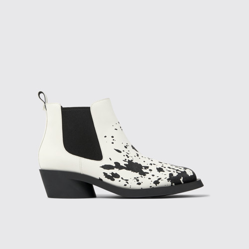 Image of Side view of Bonnie White and black leather ankle boots for women