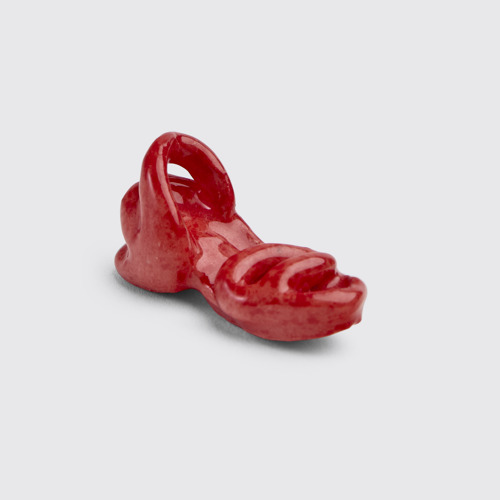 Image of Side view of Miniature Kobarah Sculpture Ceramic shoe