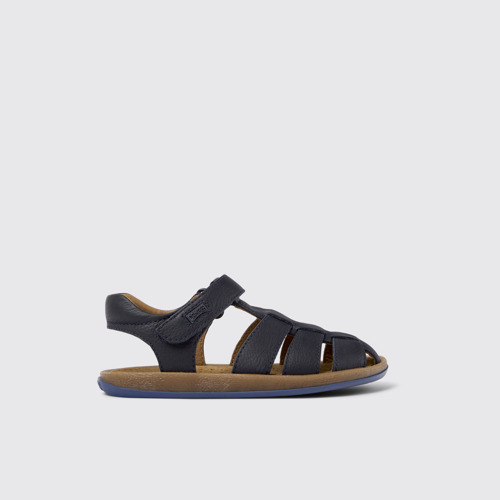 Image of Side view of Bicho Dark blue leather sandals for kids