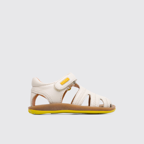 Side view of Bicho Closed cream T-strap sandal for kids