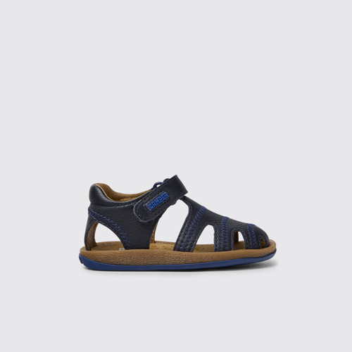 Image of Side view of Bicho Blue leather sandals for kids