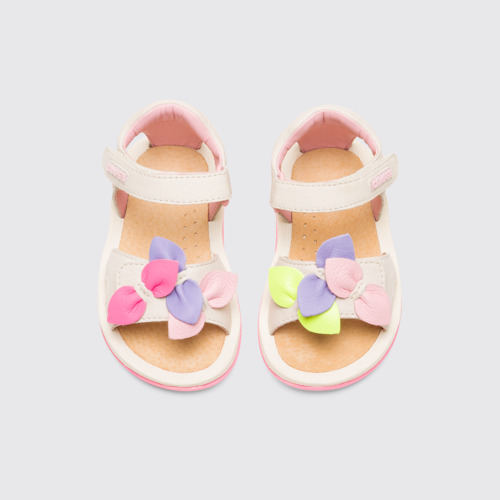 Overhead view of Twins Cream color strappy girl’s sandal